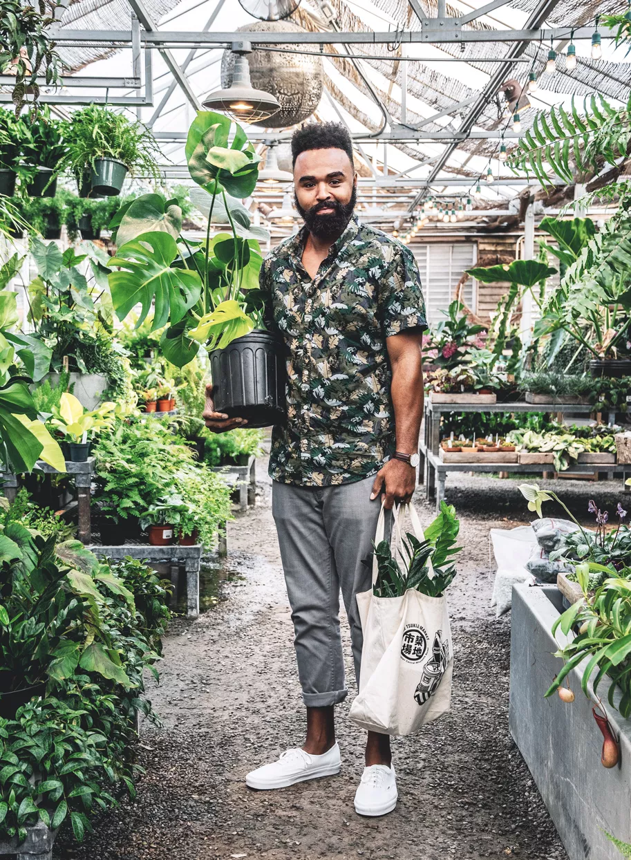 Hilton Carter in a greenhouse